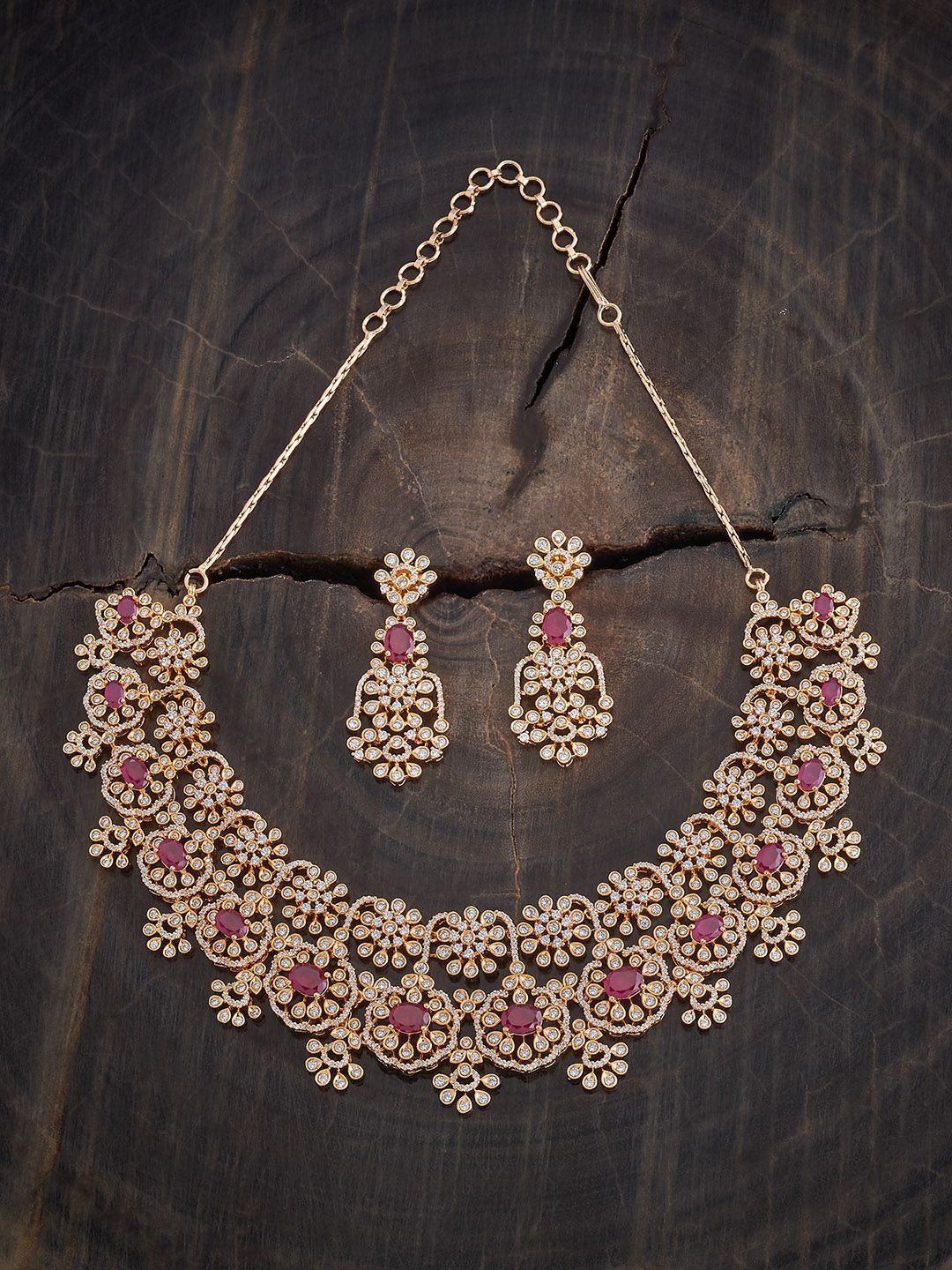 

Kushal's Fashion Jewellery Gold Plated CZ Studded Necklace and Earrings