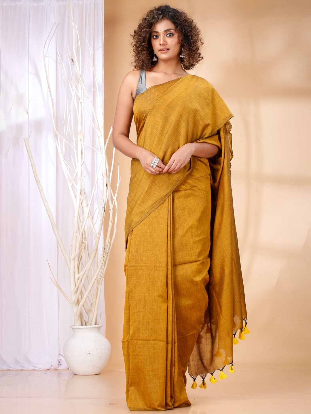 

Ruuprekha Women Pure Cotton Fusion Khadi Saree With Stitched Blouse, Mustard