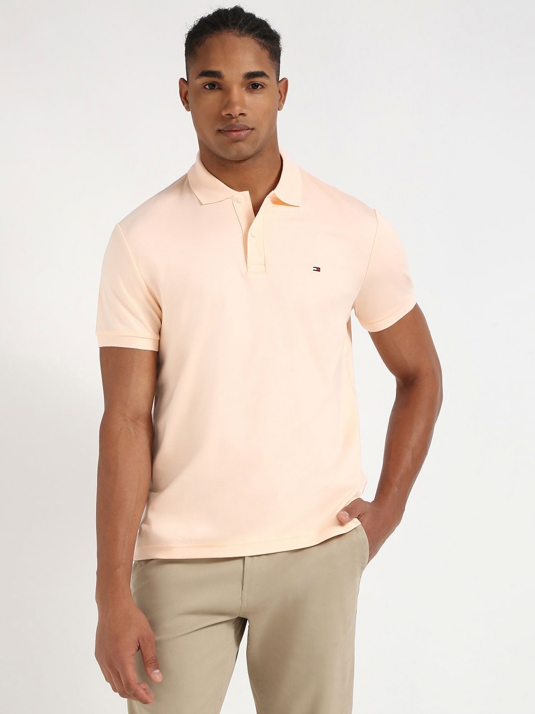 

Tommy Hilfiger Men Solid Polo Collar Cotton T-shirt, Pink