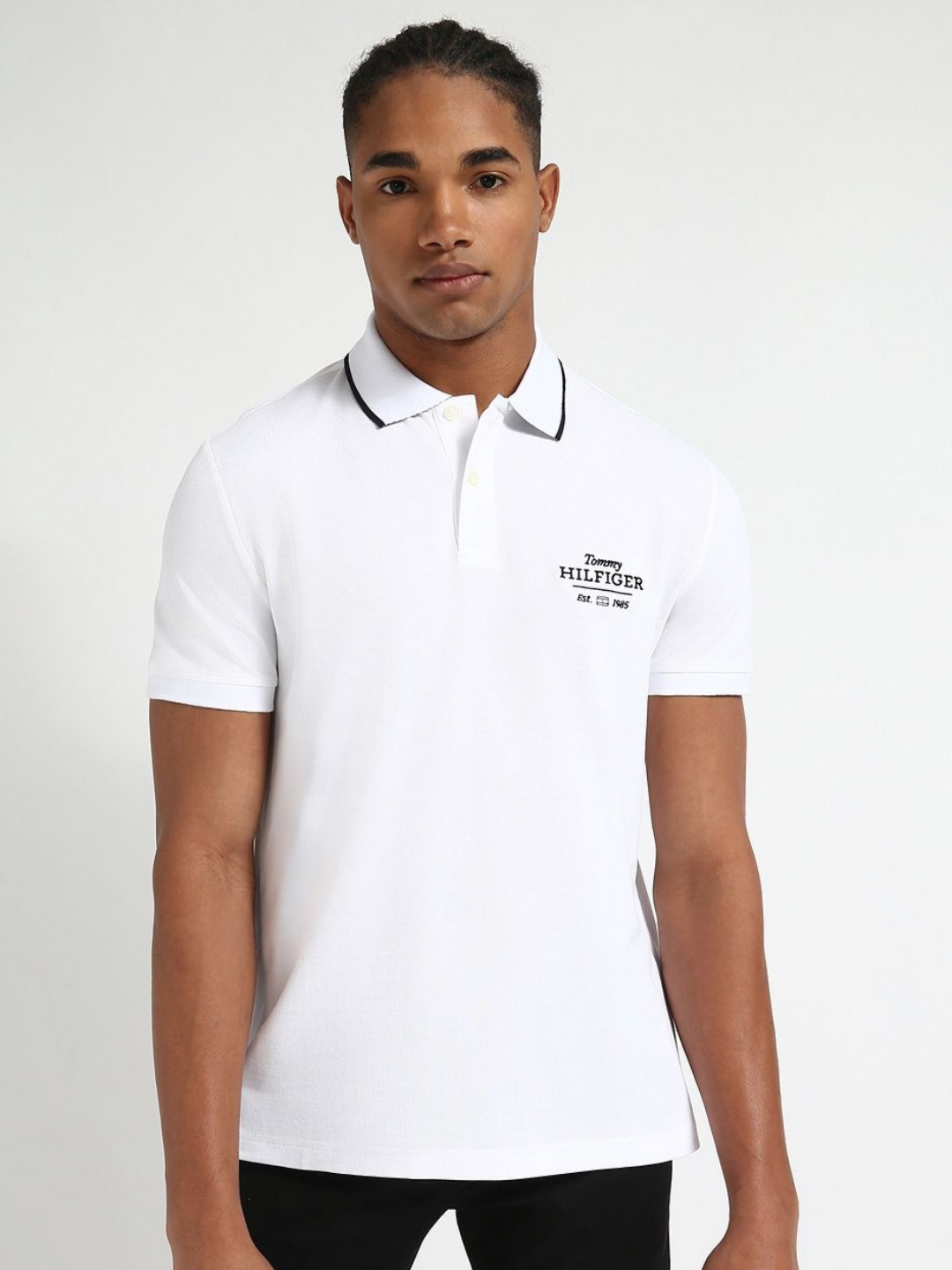 

Tommy Hilfiger Men Solid Polo Collar Cotton T-shirt, White