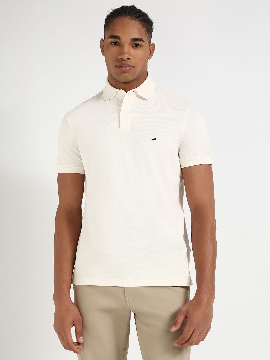 

Tommy Hilfiger Men Solid Polo Collar Cotton T-shirt, Off white