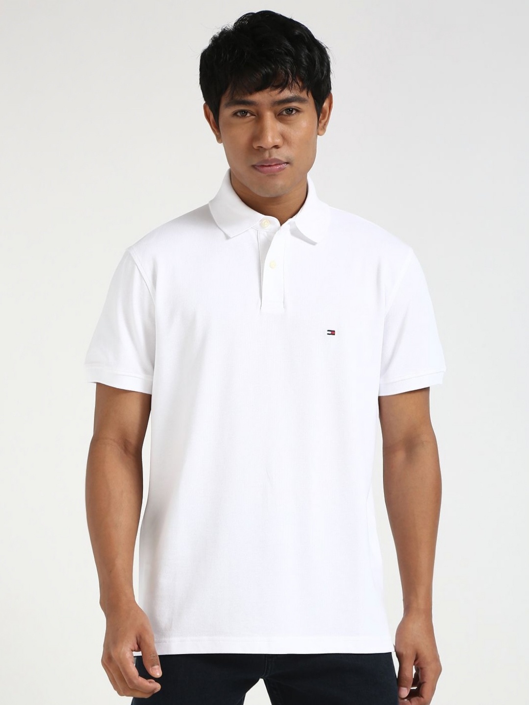 

Tommy Hilfiger Men Solid Polo Collar Cotton T-shirt, White