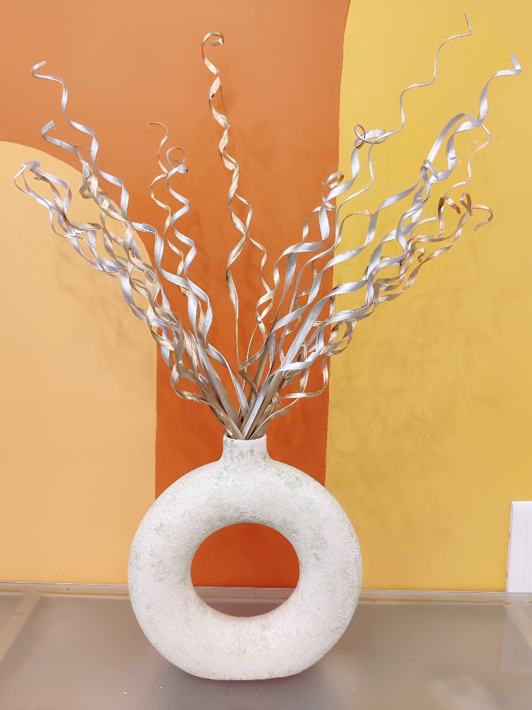 

Myntra Elegant Homes Silver-Toned 1 Bunch Palm Artificial Flower