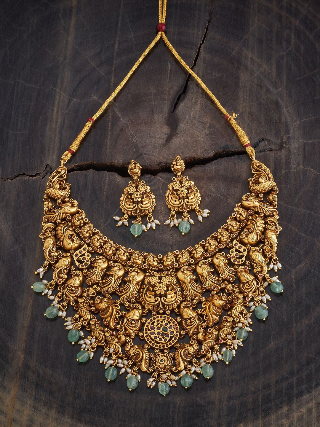 

Kushal's Fashion Jewellery Gold Plated Stones Studded Antique Necklace & Earrings