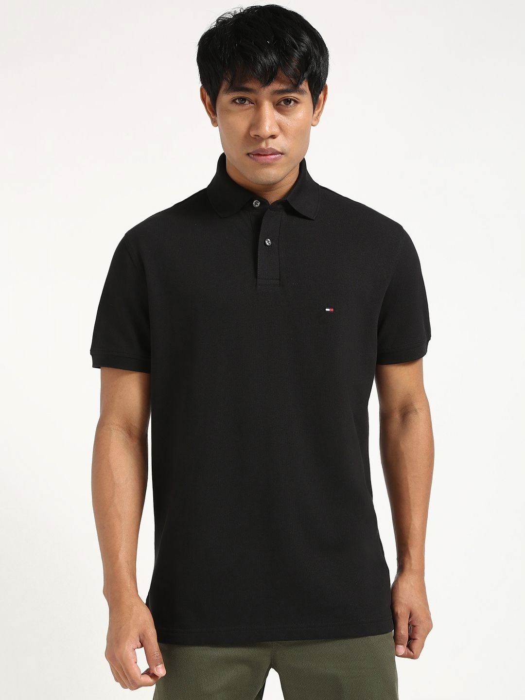 

Tommy Hilfiger Men Solid Polo Collar Cotton T-shirt, Black