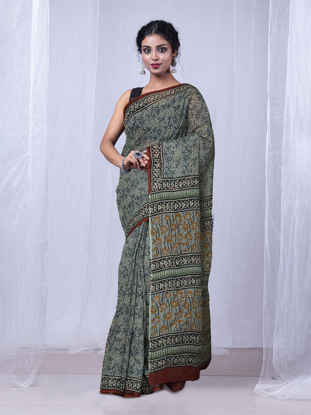 

Unnati Silks Ethnic Motifs Net Handloom Kota Saree, Green