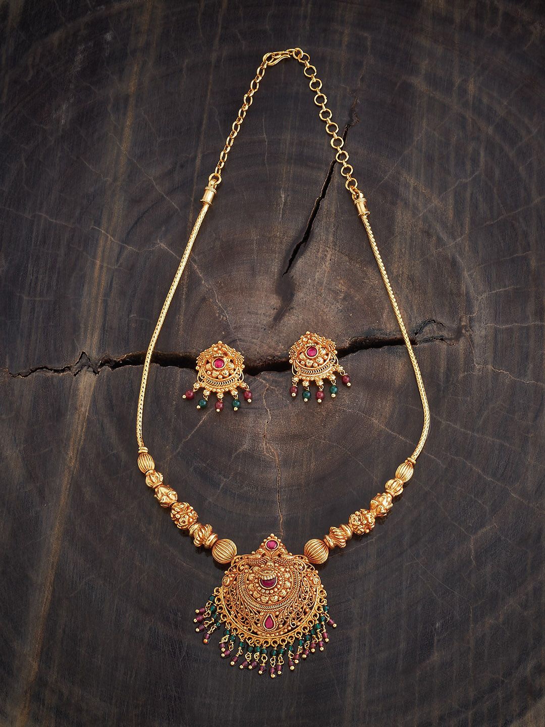 

Kushal's Fashion Jewellery Gold Plated Stones Studded & Beaded Antique Jewellery Set