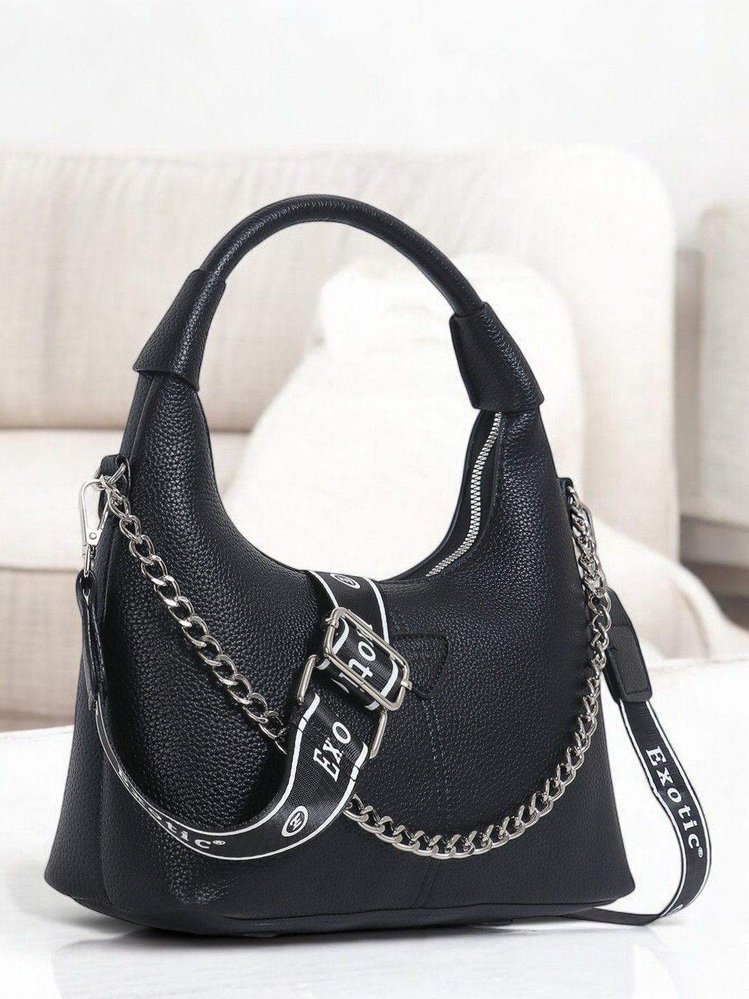 

Exotic Textured Swagger Sling Bag, Black