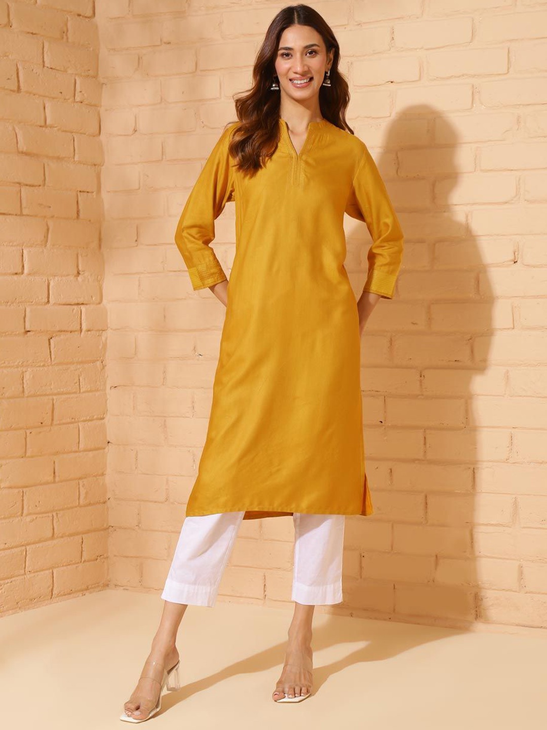 

Fabindia Women Thread Work Kurta, Mustard