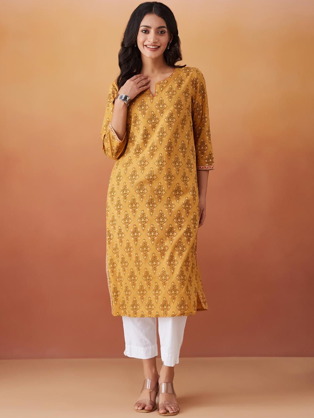 

Fabindia Women Floral Printed Thread Work Kurta, Mustard