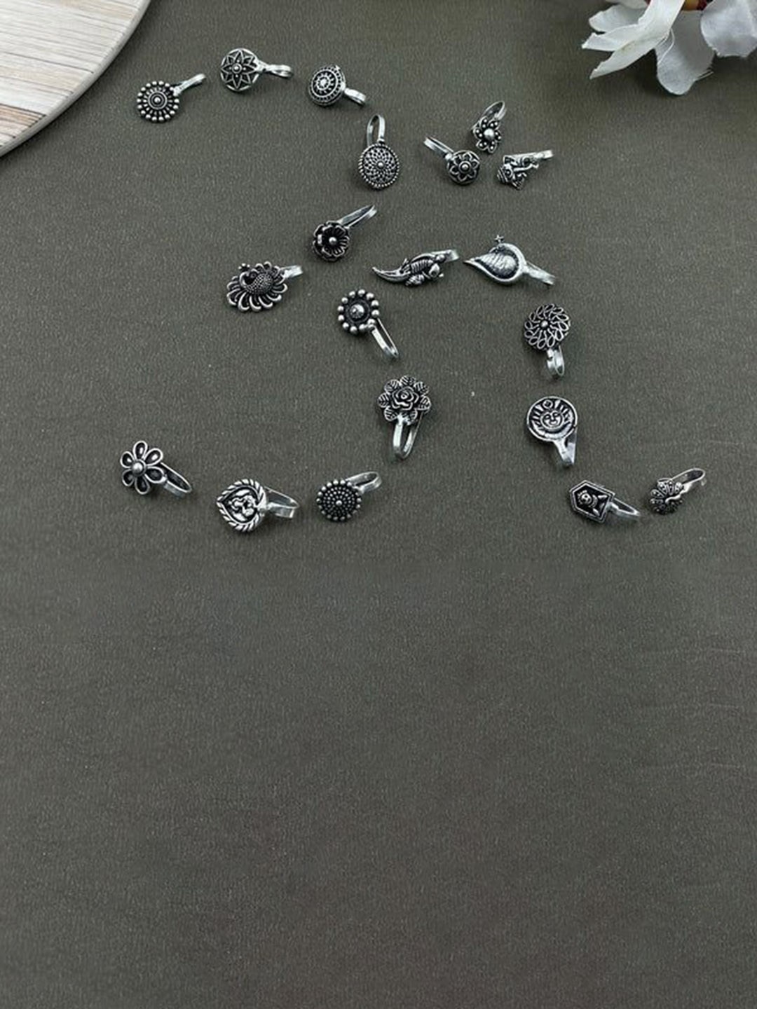 

NAMAN ARTS Set Of 20 Silver-Plated Oxidised Stud Nosepins