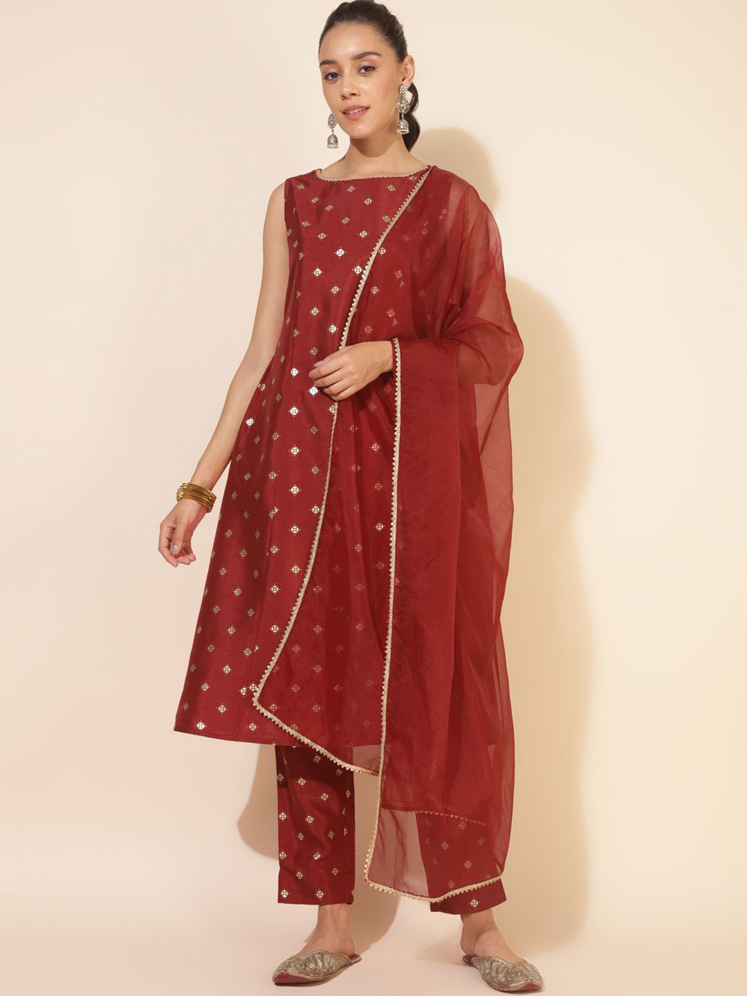 

Janasya Women Printed Regular Gotta Patti Kurta with Trousers & With Dupatta, Maroon