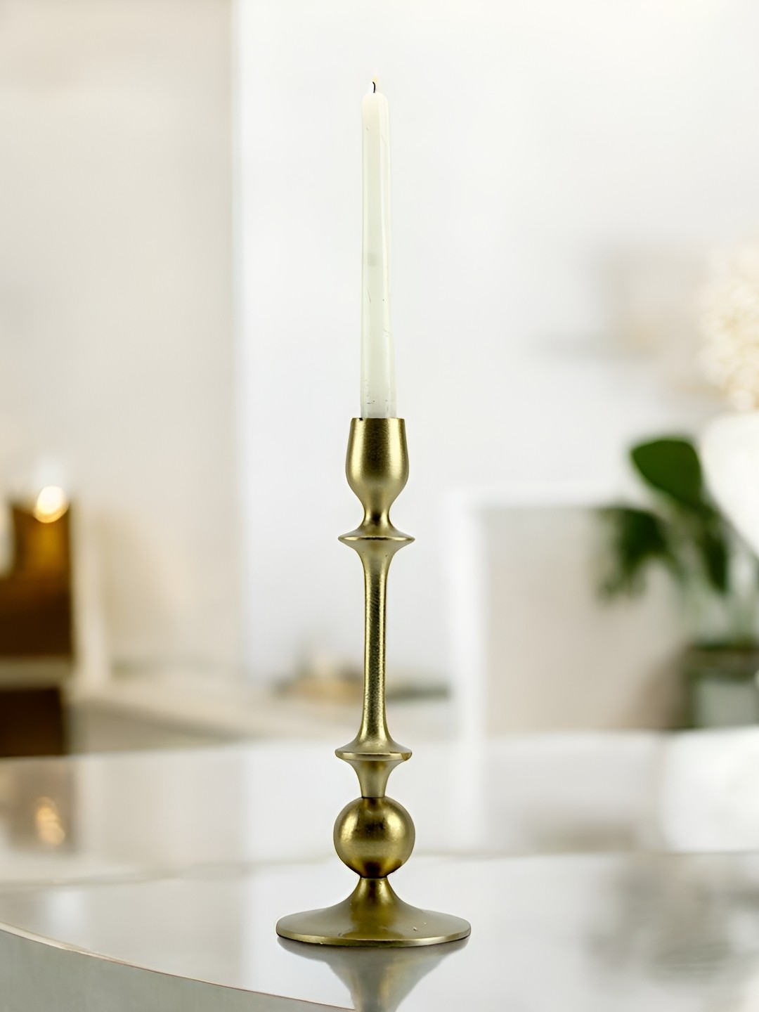 

Hind Decor Gold-Toned Candle Holder