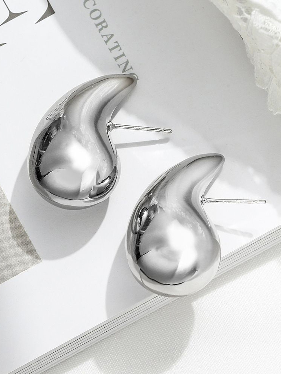

Celestique Teardrop Shaped Studs Earrings, Silver