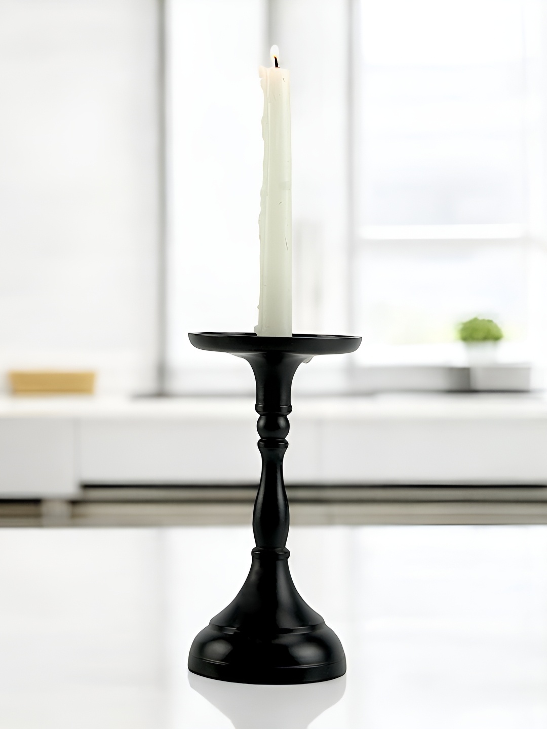 

Hind Decor Black Candle Holder