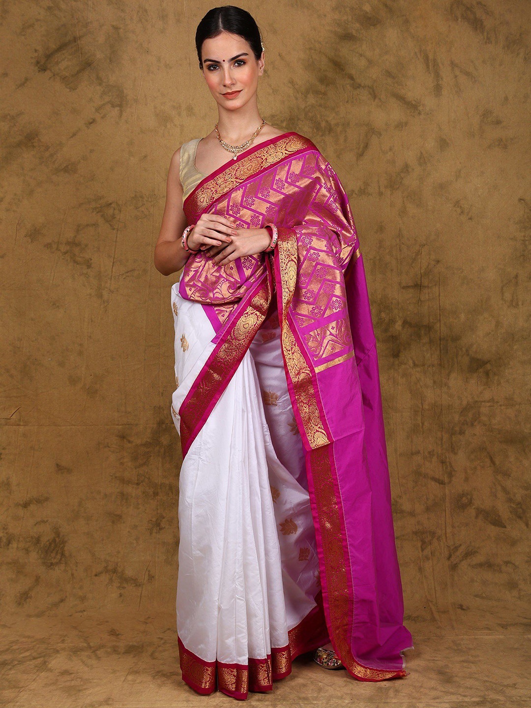 

Exotic India Bootis Motifs Temple Saree with Zari Woven Chevron Pallu and Paisley Border, White