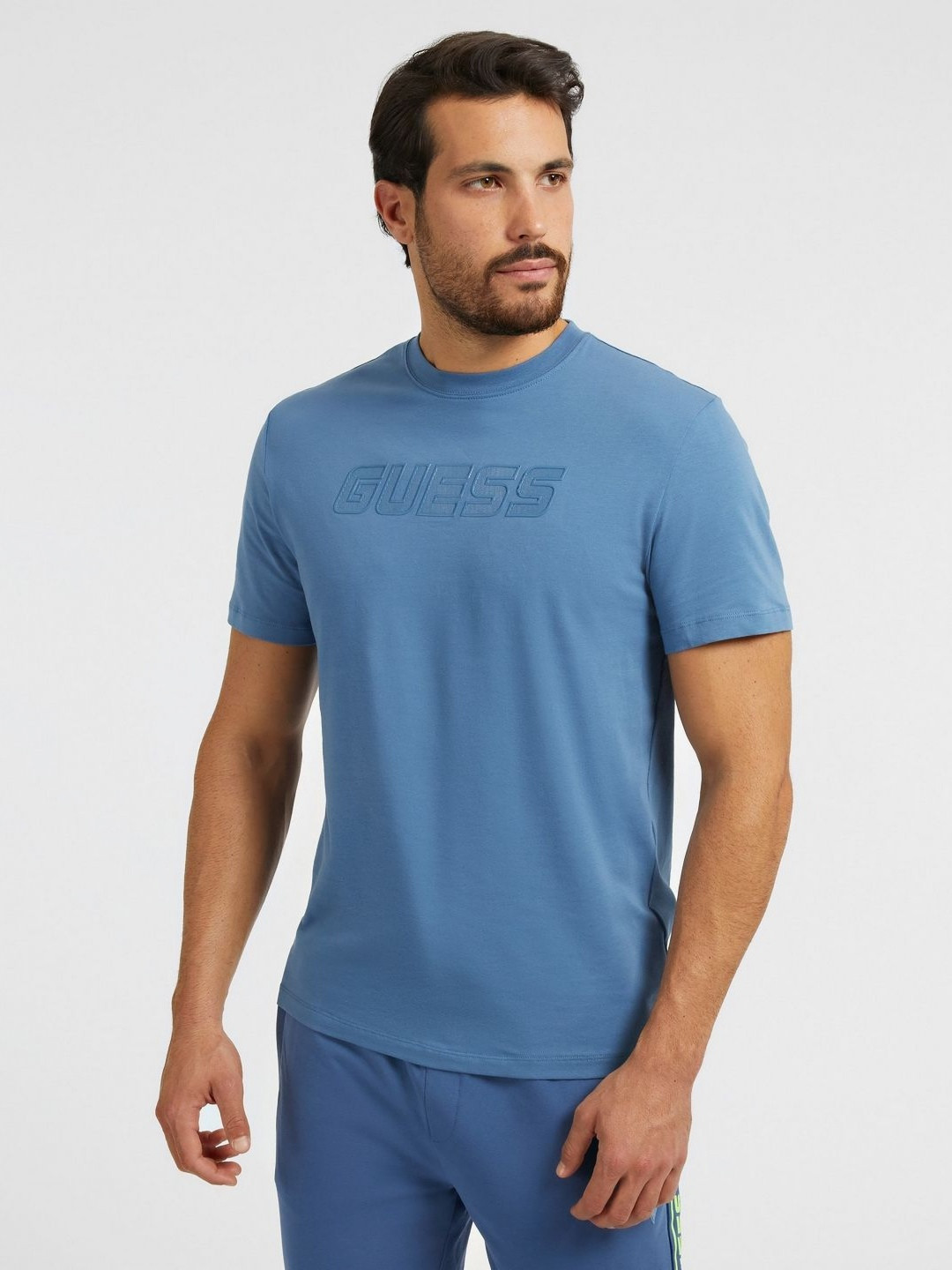 

GUESS Men Typography Printed Pockets T-shirt, Blue