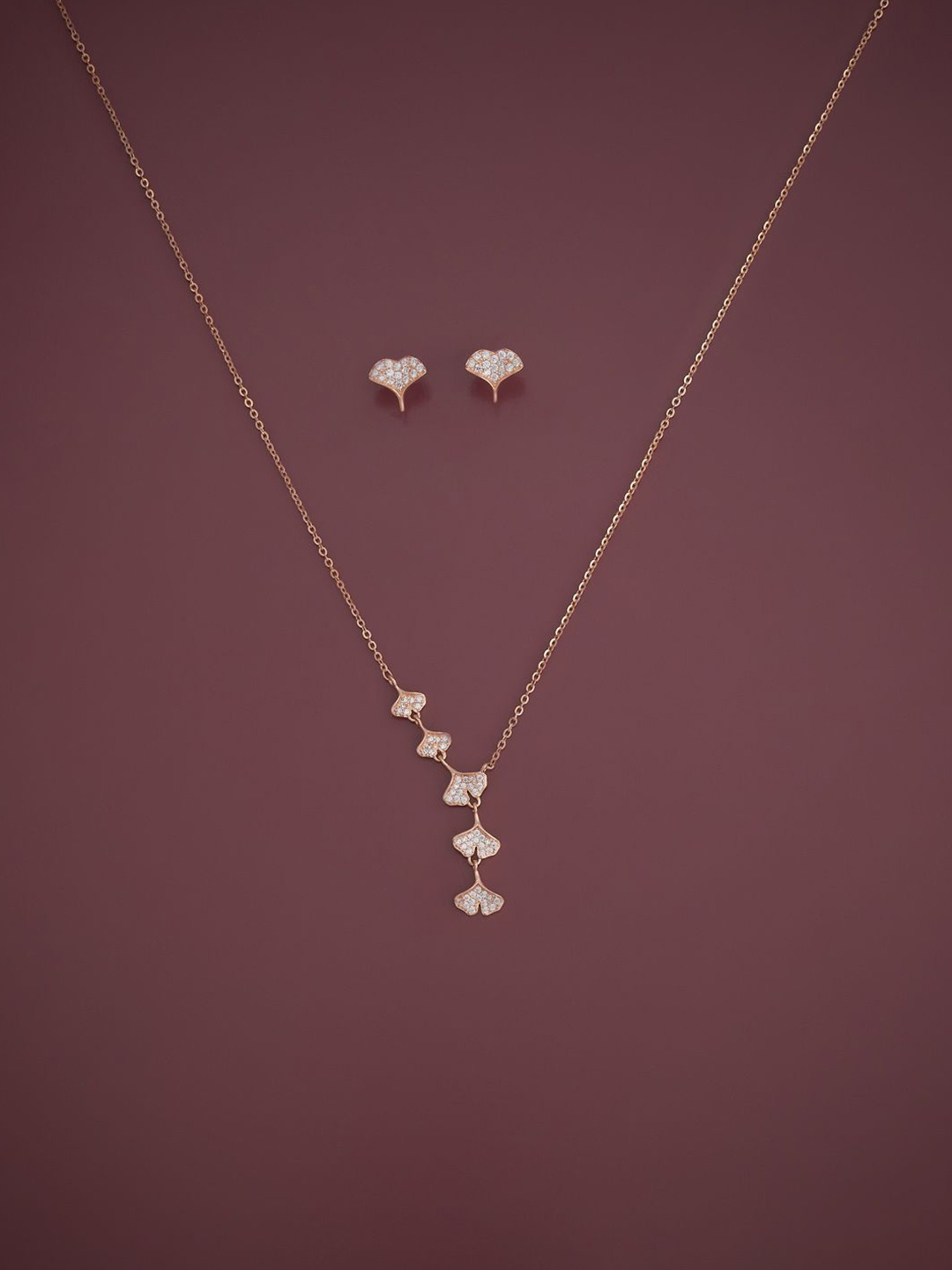 

Kushal's Fashion Jewellery Silver Rose Gold Plated CZ Studded Jewellery Set