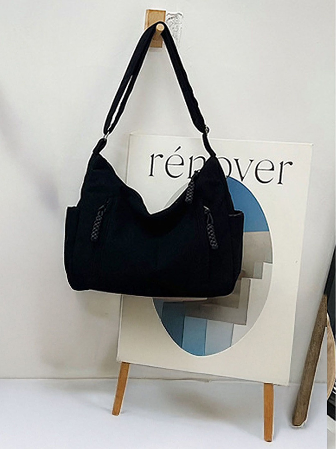 

StyleCast Black Solid Structured Sling Bag