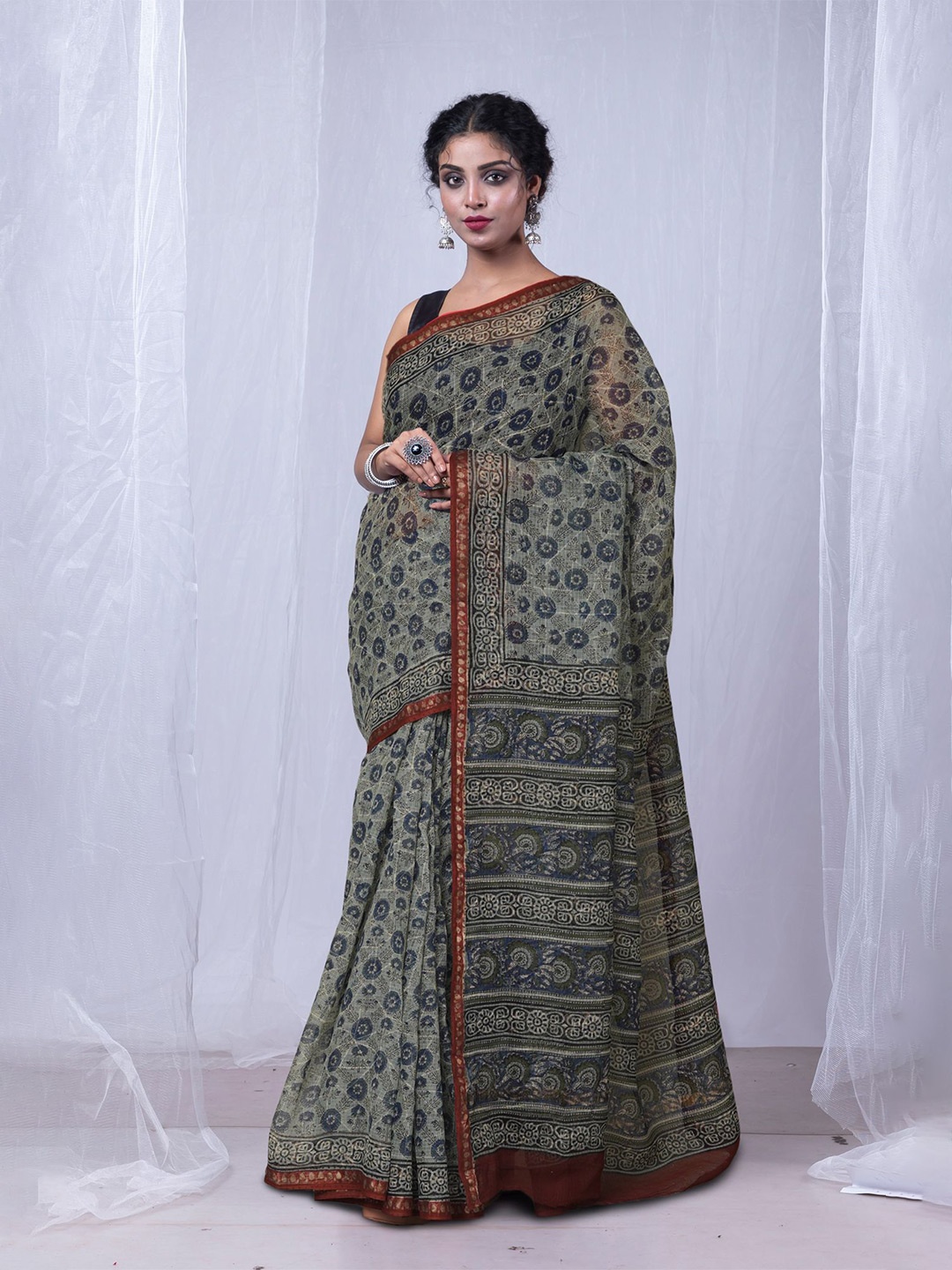 

Unnati Silks Floral Net Handloom Kota Saree, Blue
