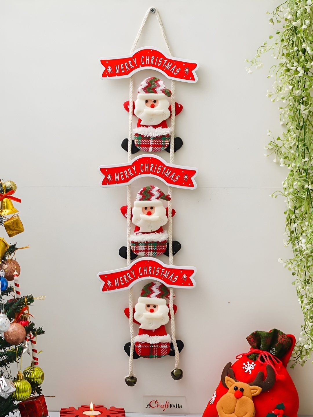 

eCraftIndia Red Santa Claus Climbing on Rope Merry Christmas Wall Hanging