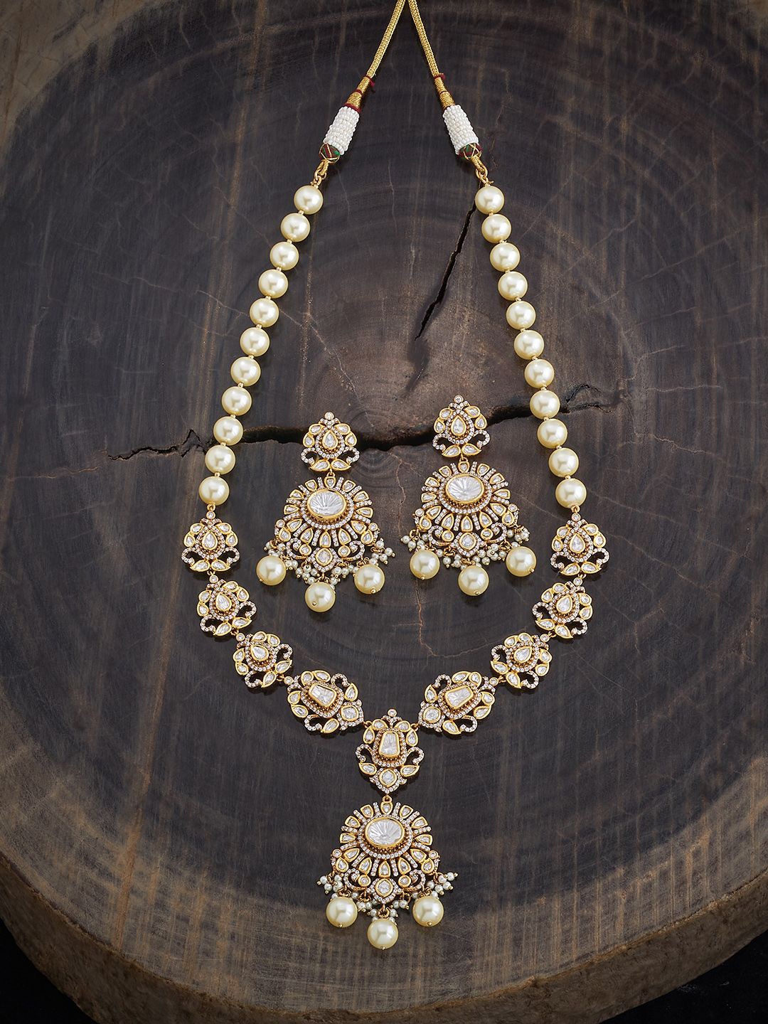 

Kushal's Fashion Jewellery Gold-Plated Kundan Stone Studded & Pearls Beaded Jewellery Set