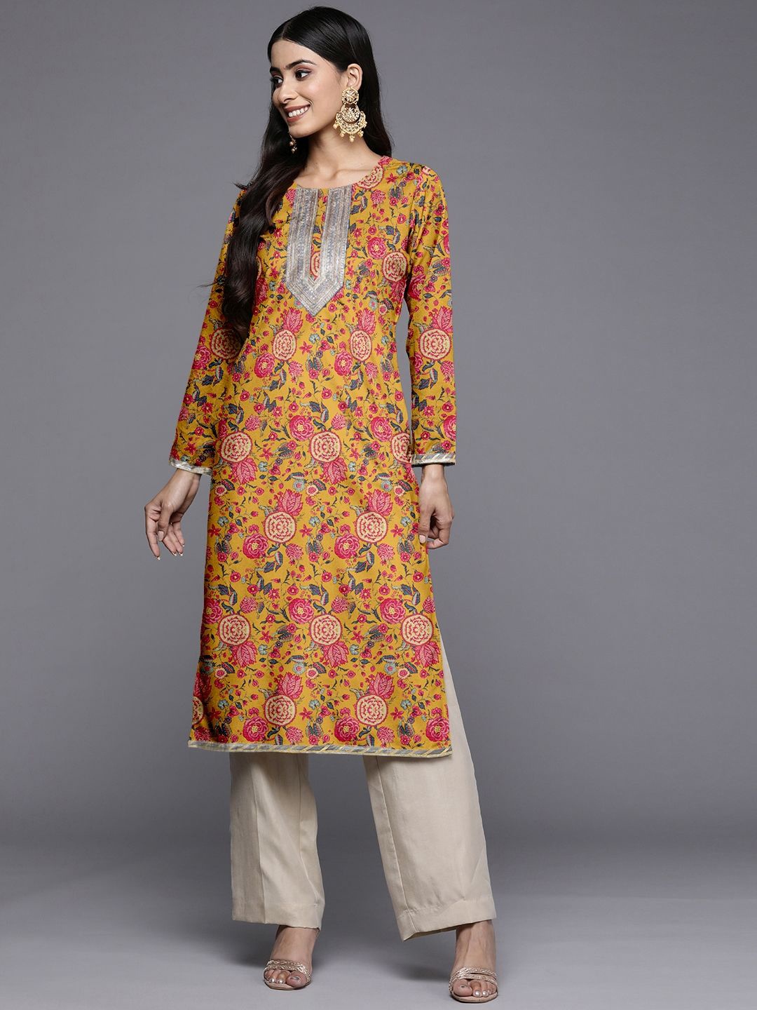 

Ahalyaa Women Floral Printed Patchwork Velvet Kurta, Mustard