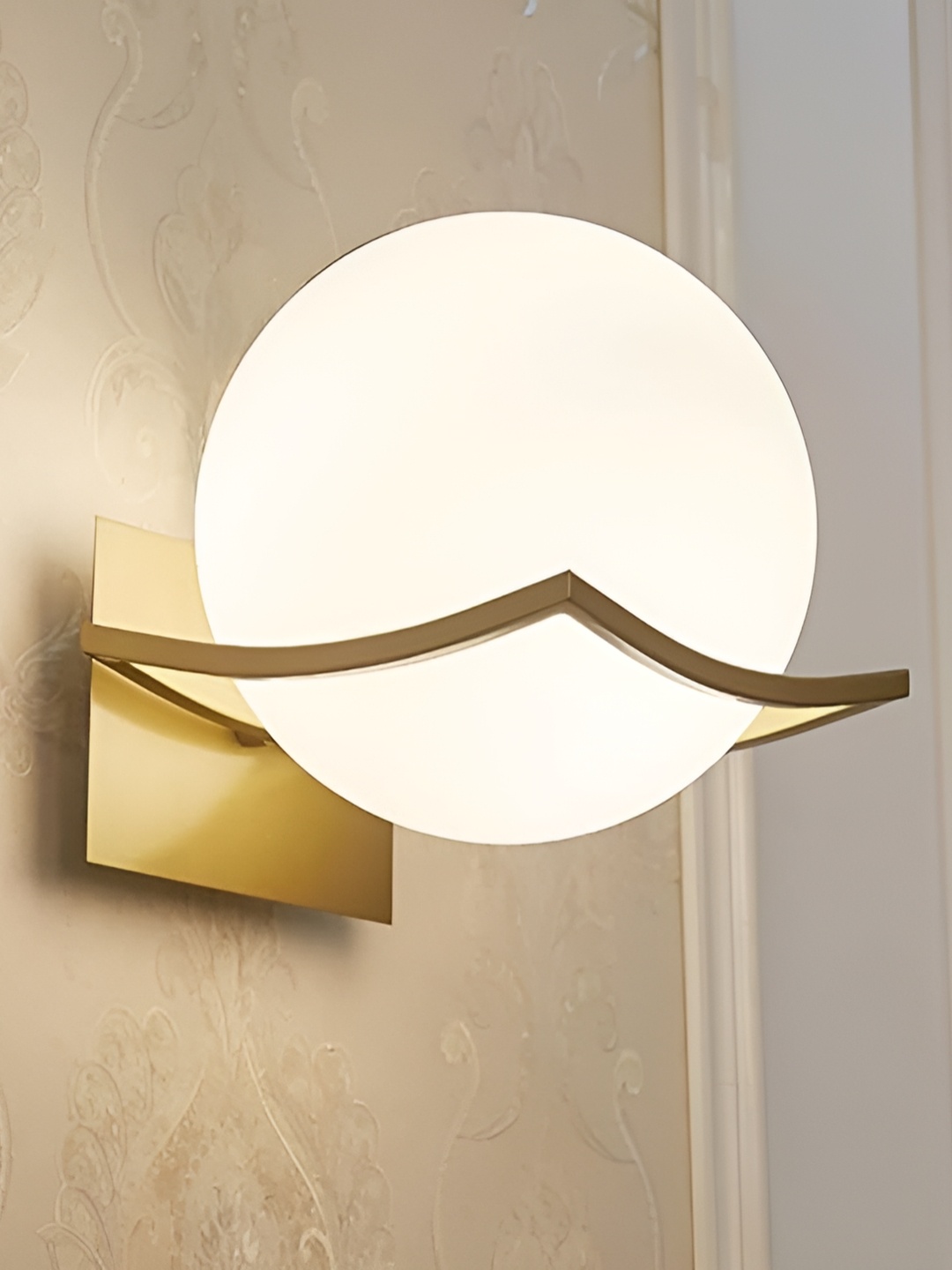 

Raptors Gold-Toned & White Metal Contemporary Spherical Shaped Wall Lamp