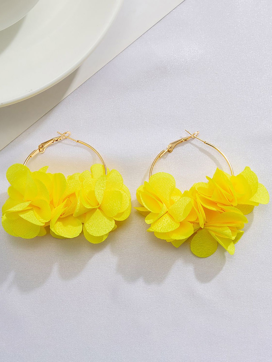 

StyleCast x Revolte Floral Studs Earrings, Yellow