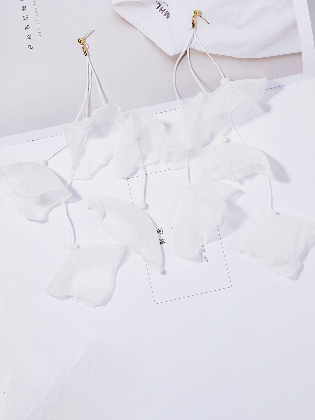 

StyleCast x Revolte Floral Drop Earrings, White