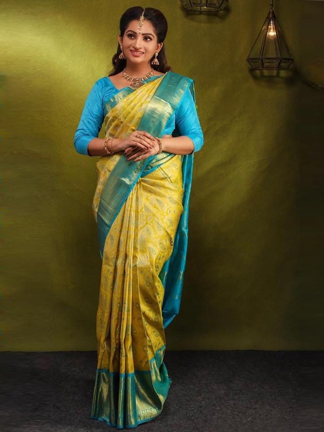 

Anouk Woven Design Zari Silk Blend Kanjeevaram Saree, Yellow