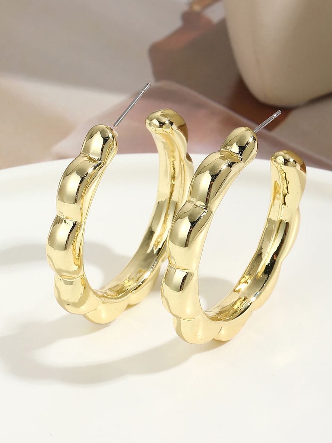 

StyleCast x Revolte Circular Half Hoop Earrings, Gold
