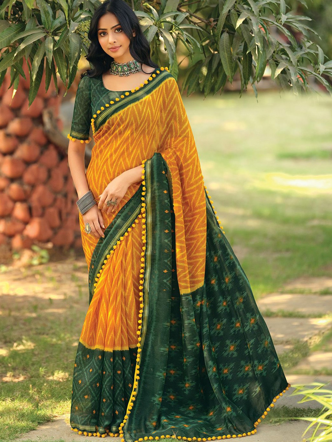 

Saree mall Ikat Sarees, Mustard