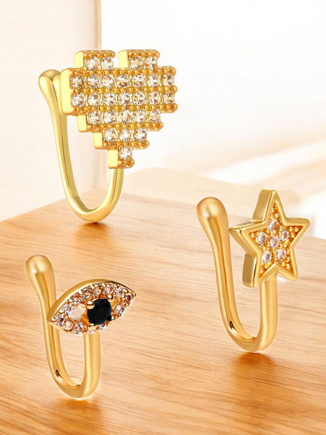 

OOMPH Set Of 3 Star Heart Evil Eye Shaped Cubic Zirconia Stud Nosepins, Gold