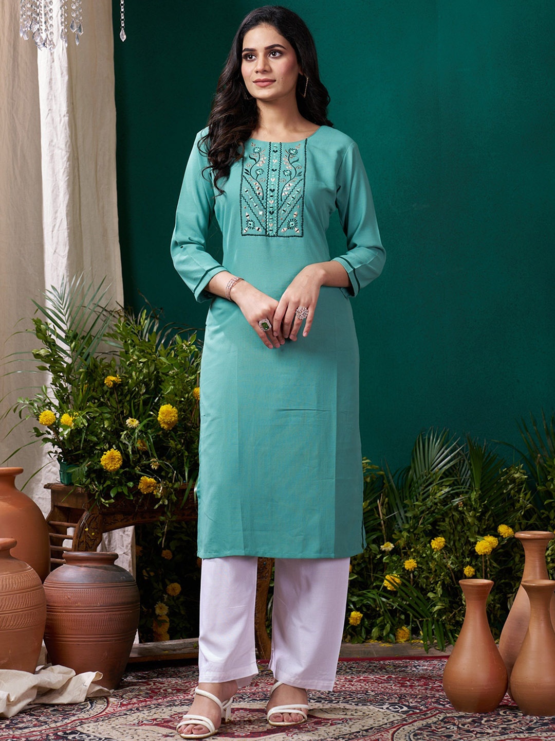 

Rujave Women Floral Embroidered Empire Kurta with Trousers, Turquoise blue