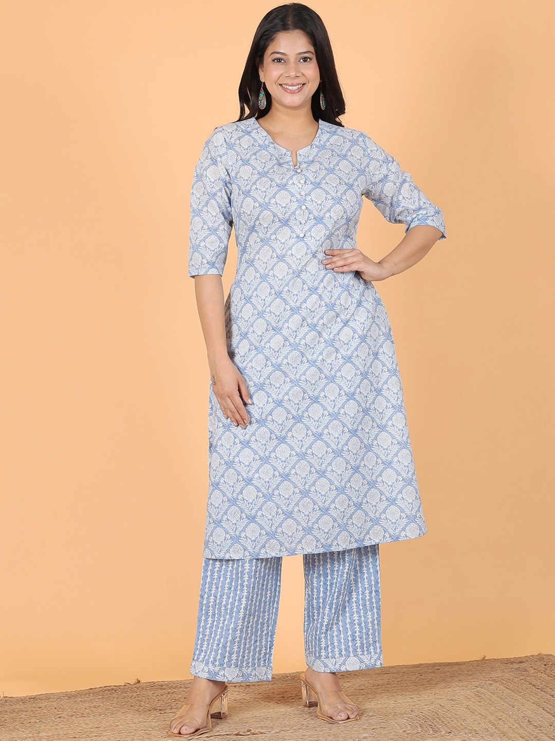 

Aramya Women Ethnic Motifs Printed Regular Beads and Stones Pure Cotton Kurta with Trousers, Blue