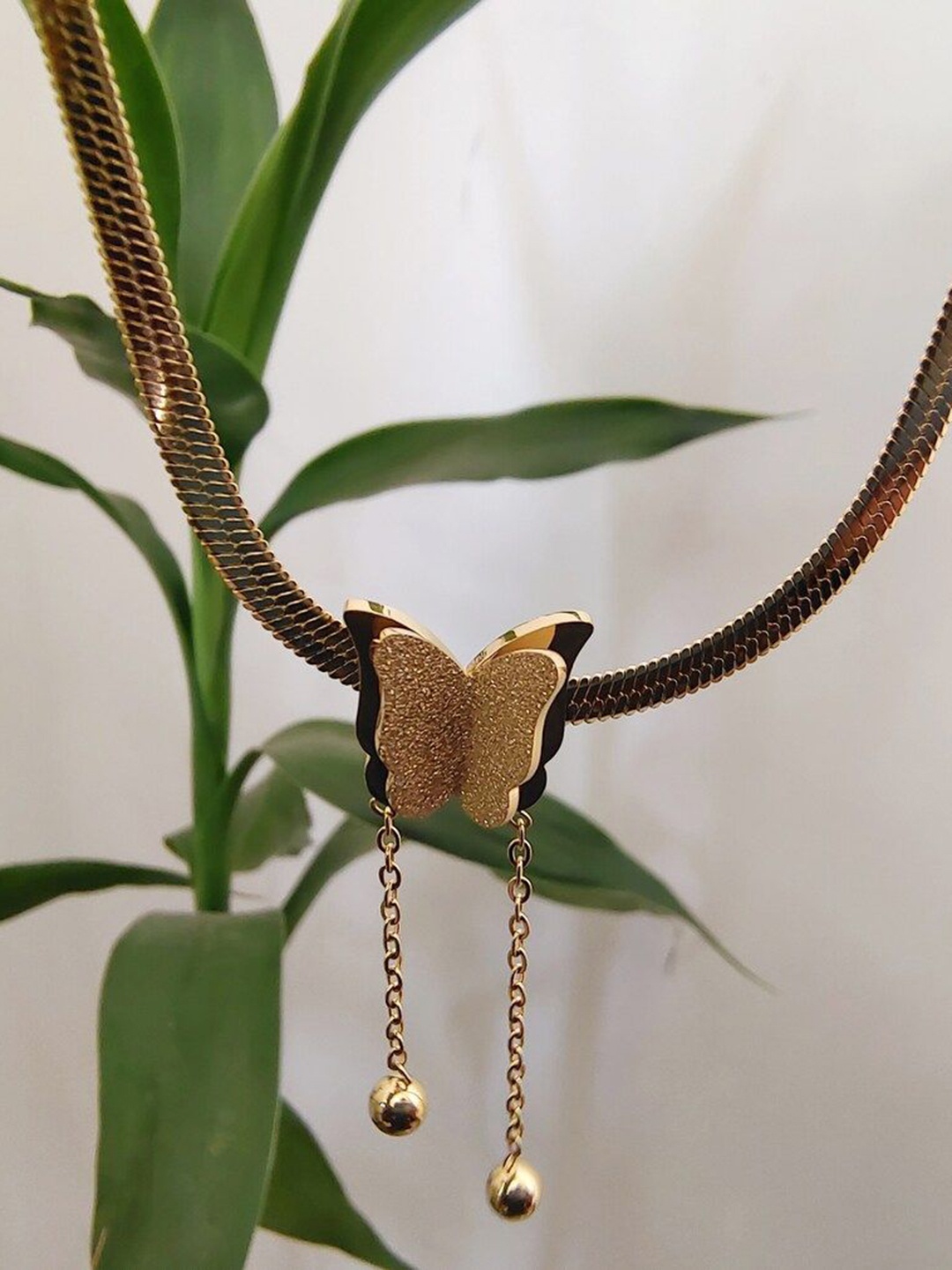 

Palli Creation Gold Plated Butterfly Locket Chain
