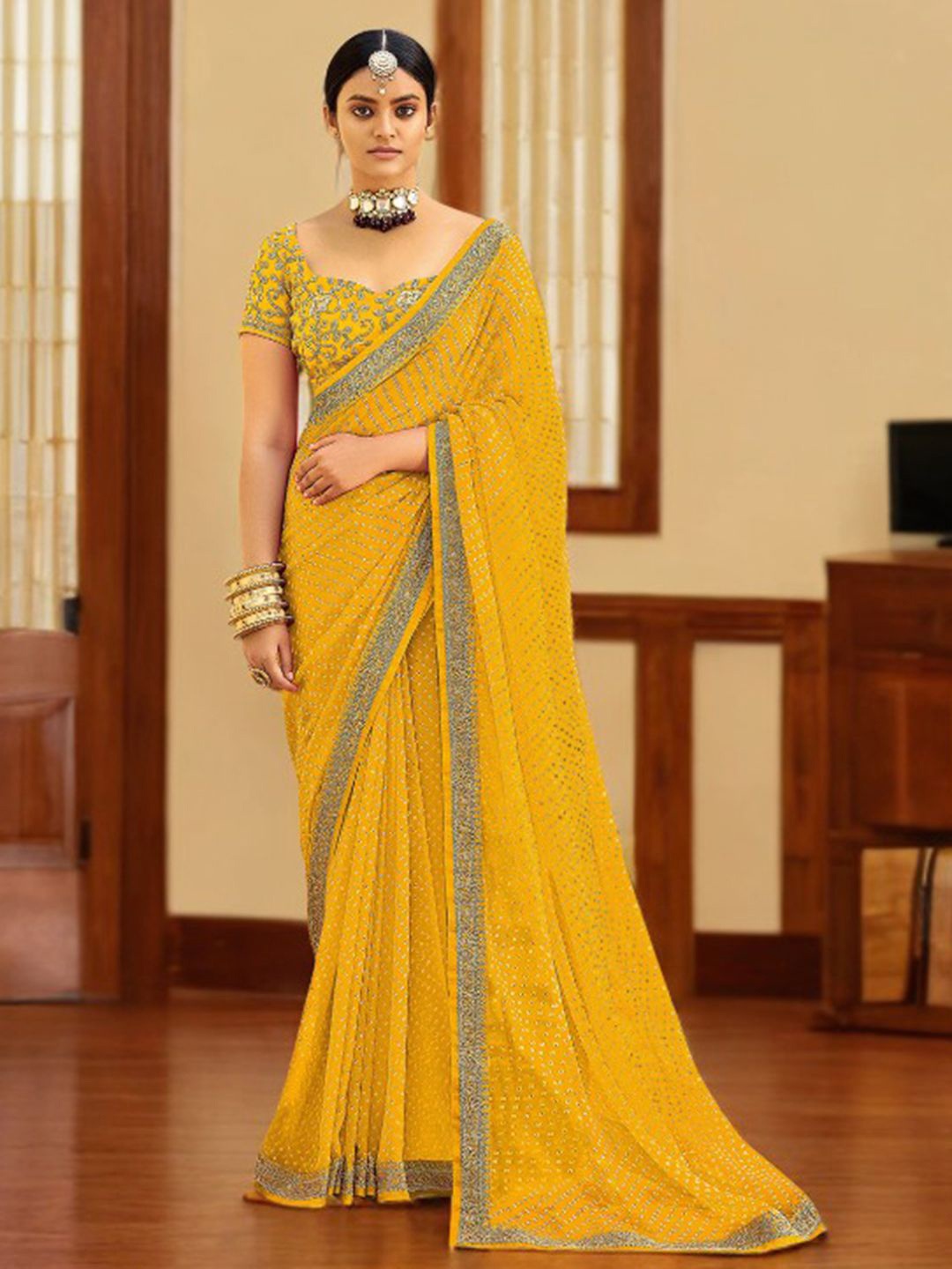 

Mitera Bandhani Pure Georgette Bandhani Saree, Yellow