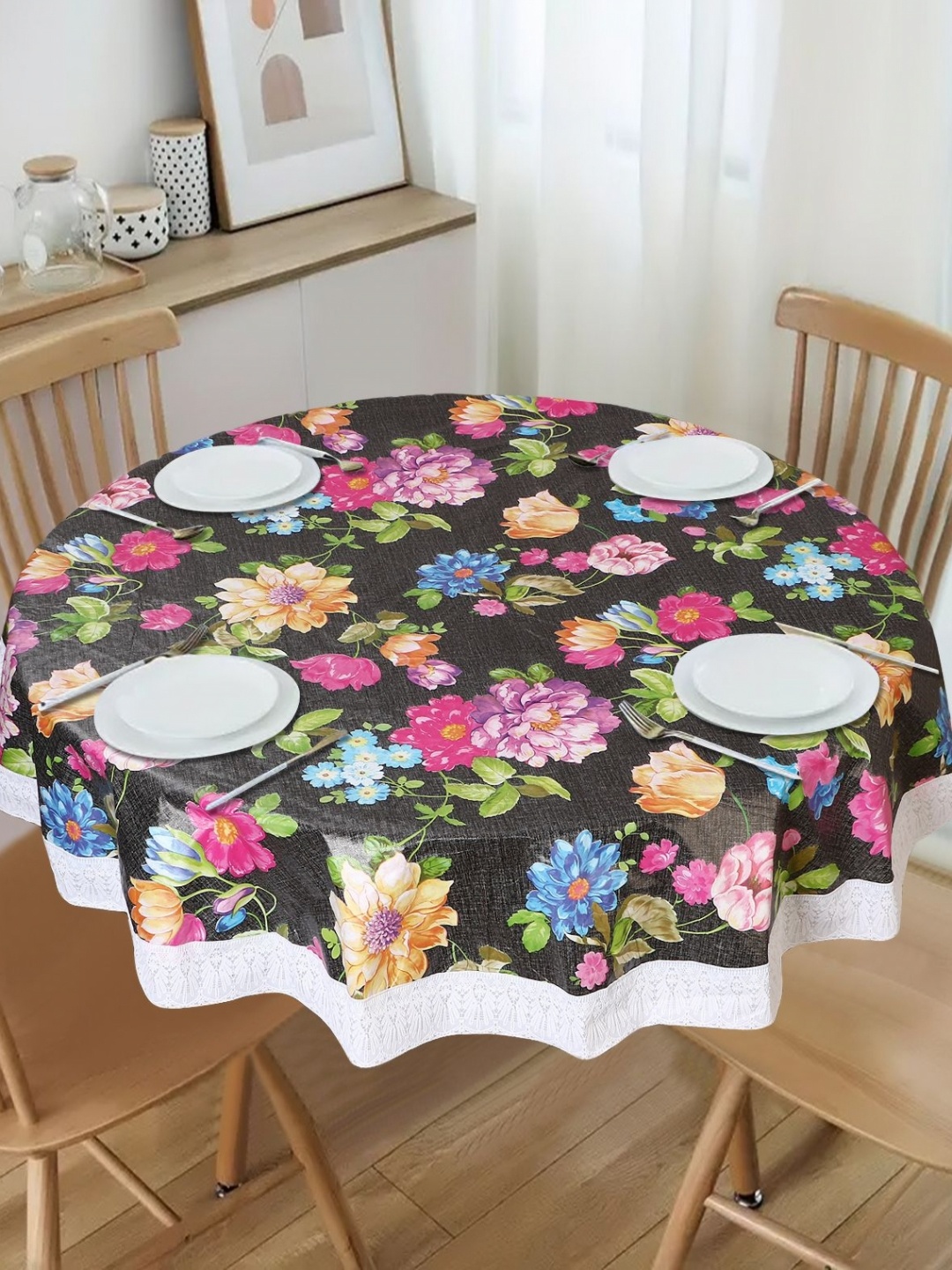 

Dakshya Industries Black Geometric Printed Waterproof Plastic Round 6-Seater Table Cover