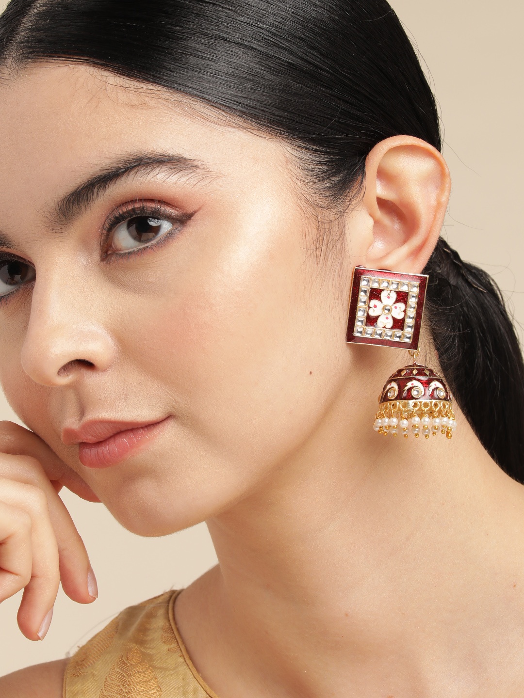 

Anouk Gold Plated Artificial Stones and Beads Meenakari Jhumkas Earrings, Maroon