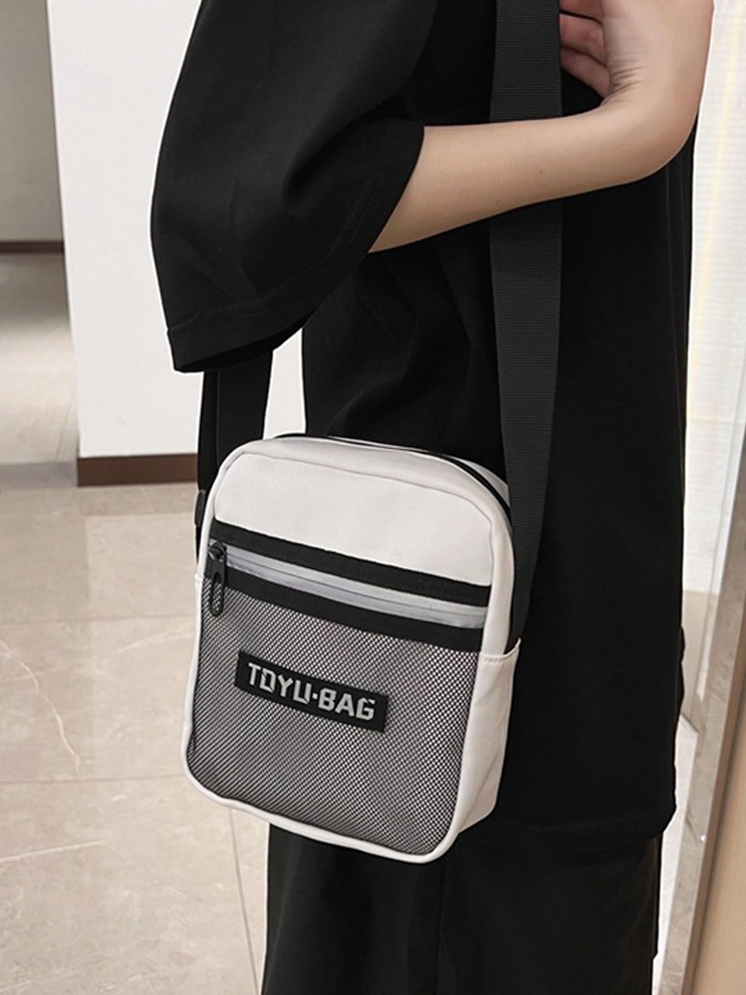 

StyleCast White & Black Structured Sling Bag