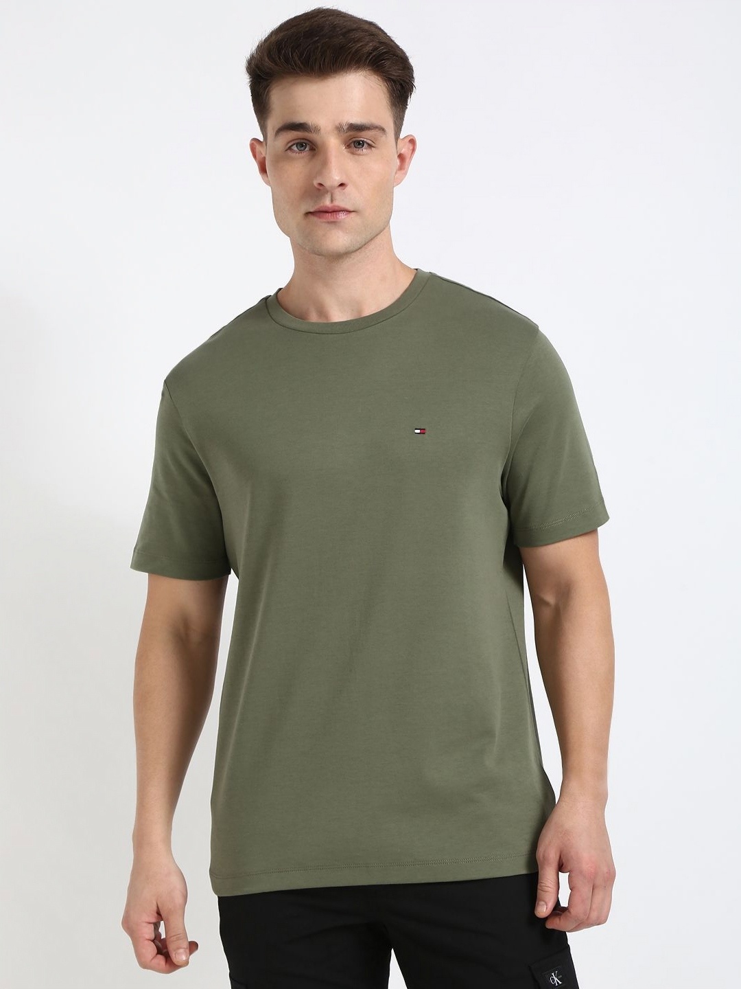 

Tommy Hilfiger Men Solid Round Neck Cotton T-shirt, Green