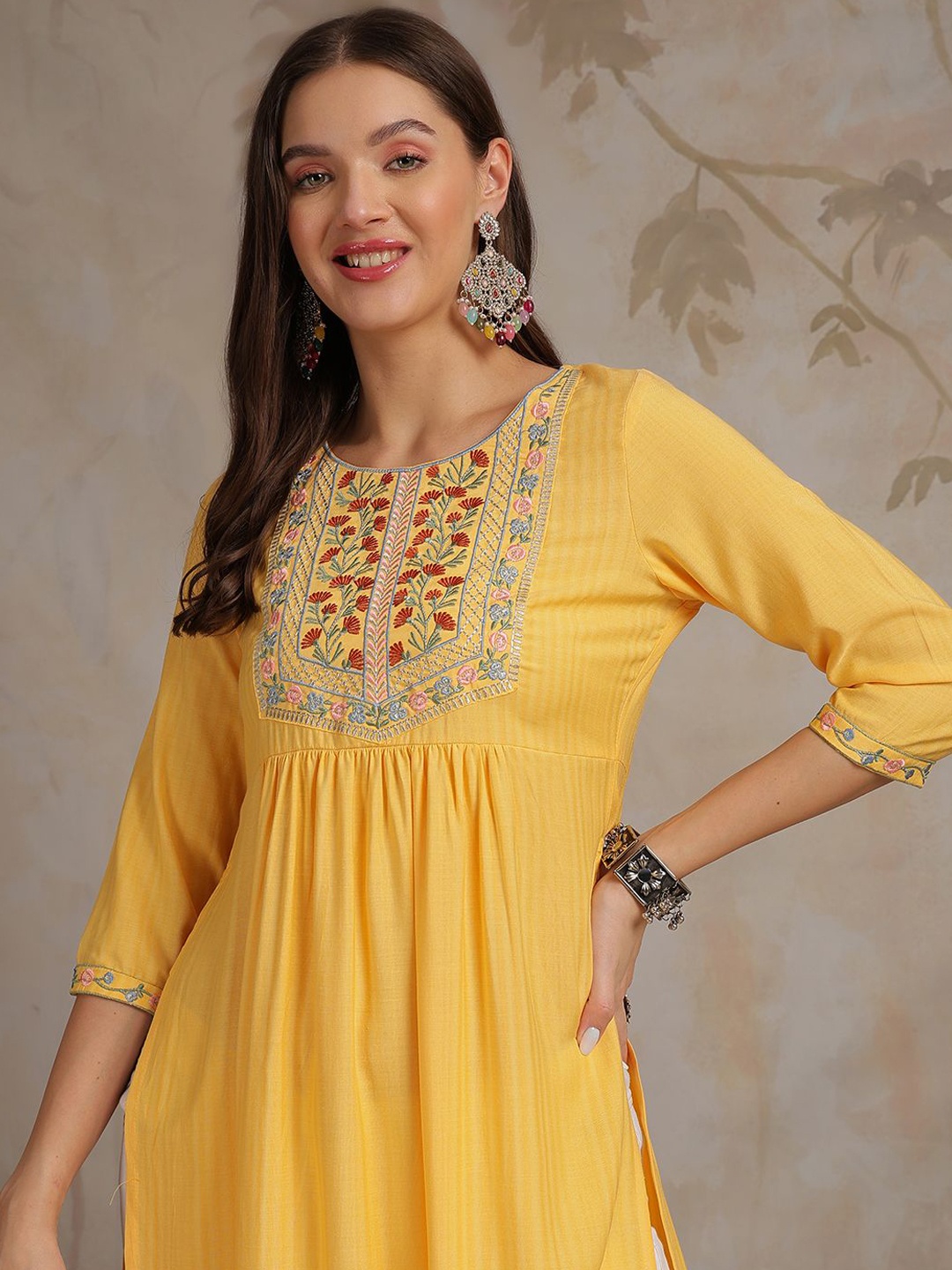 

Anouk Women Embroidered Thread Work Dobby Kurta, Mustard