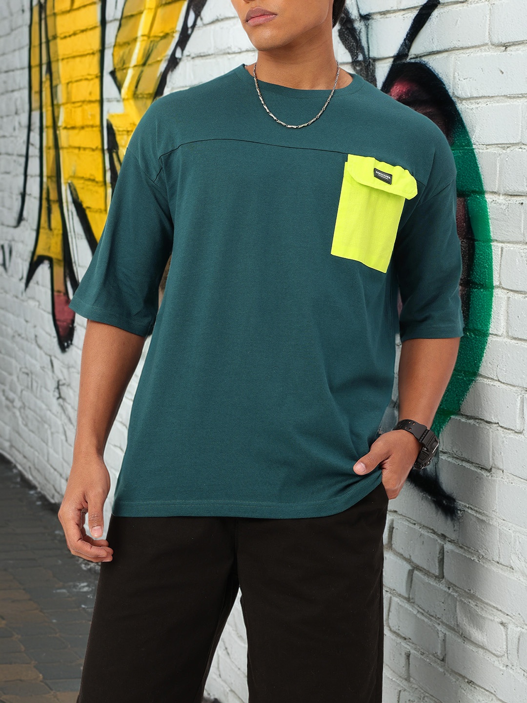 

Kook N Keech Modern Edge Chest Pocket Oversized T-shirt, Teal