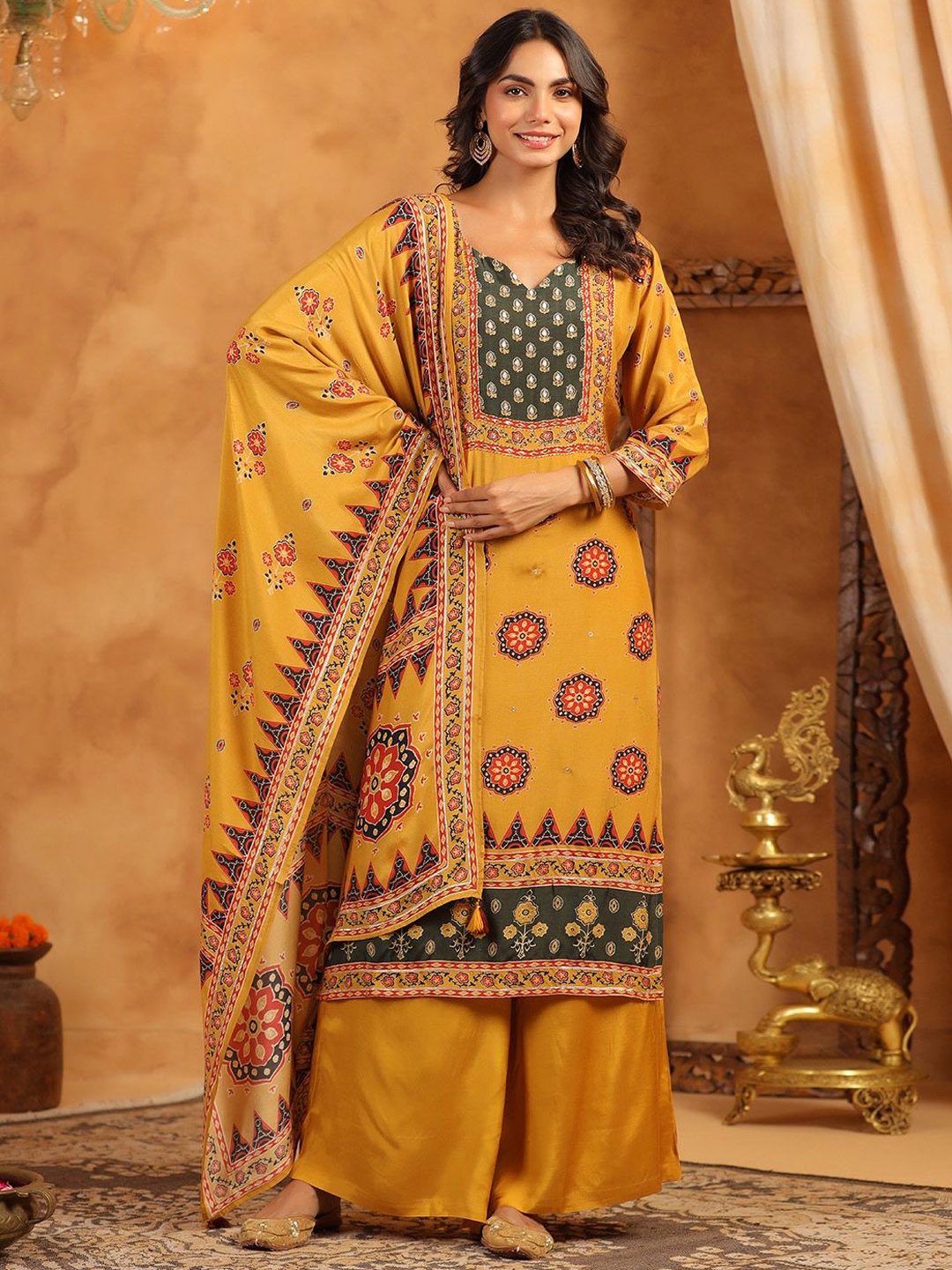 

Meena Bazaar Women Printed Regular Sequinned Kurta with Palazzos & With Dupatta, Mustard