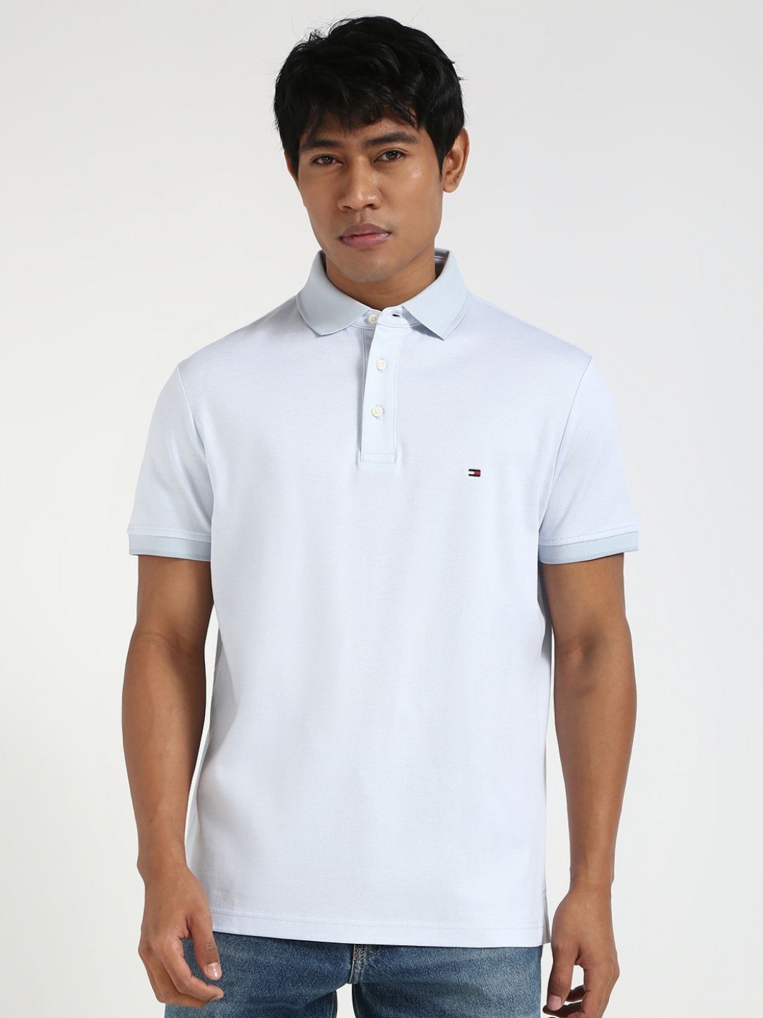

Tommy Hilfiger Men Solid Polo Collar Cotton T-shirt, Blue