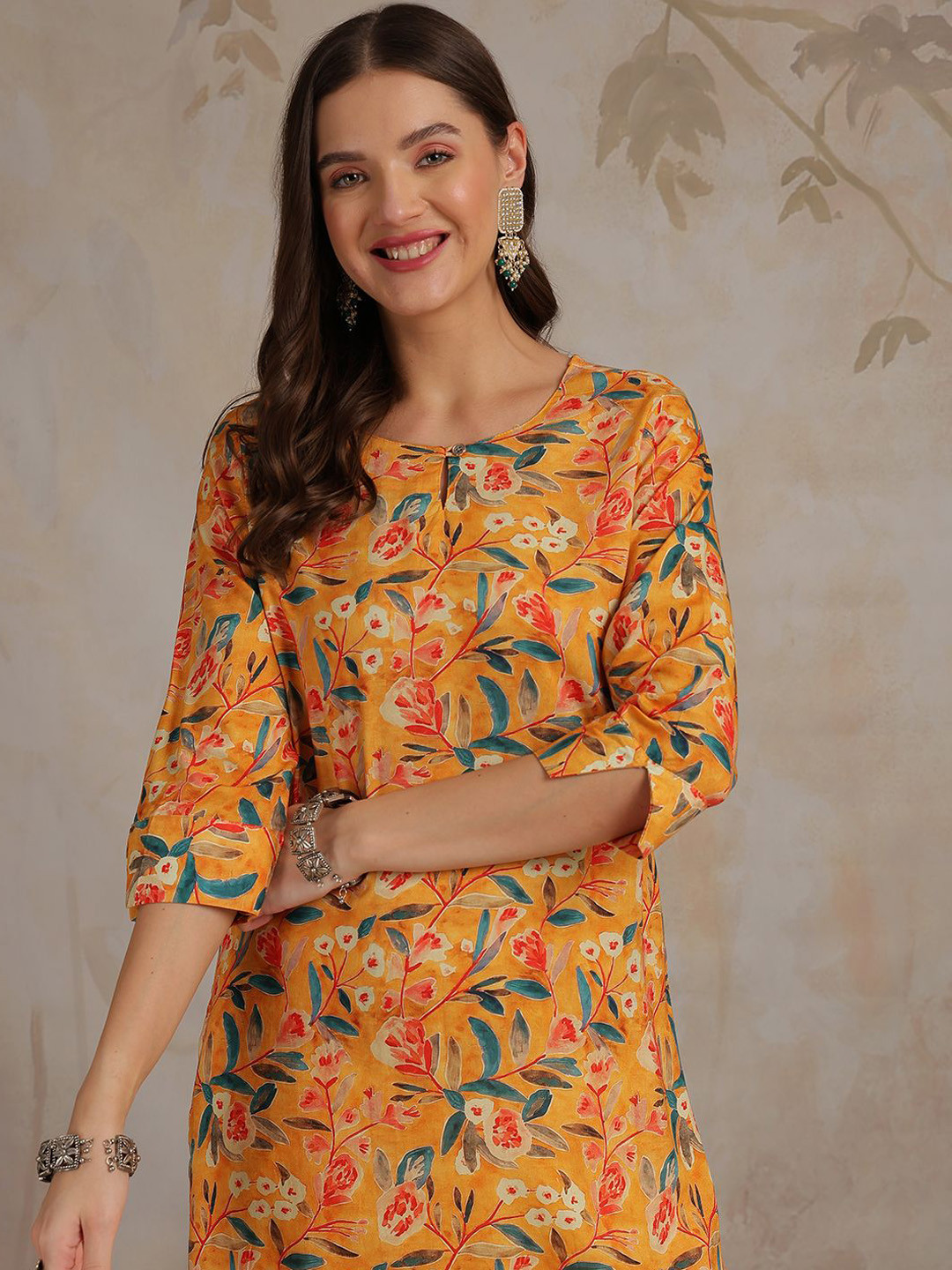 

Anouk Women Floral Printed Thread Work Kurta, Mustard
