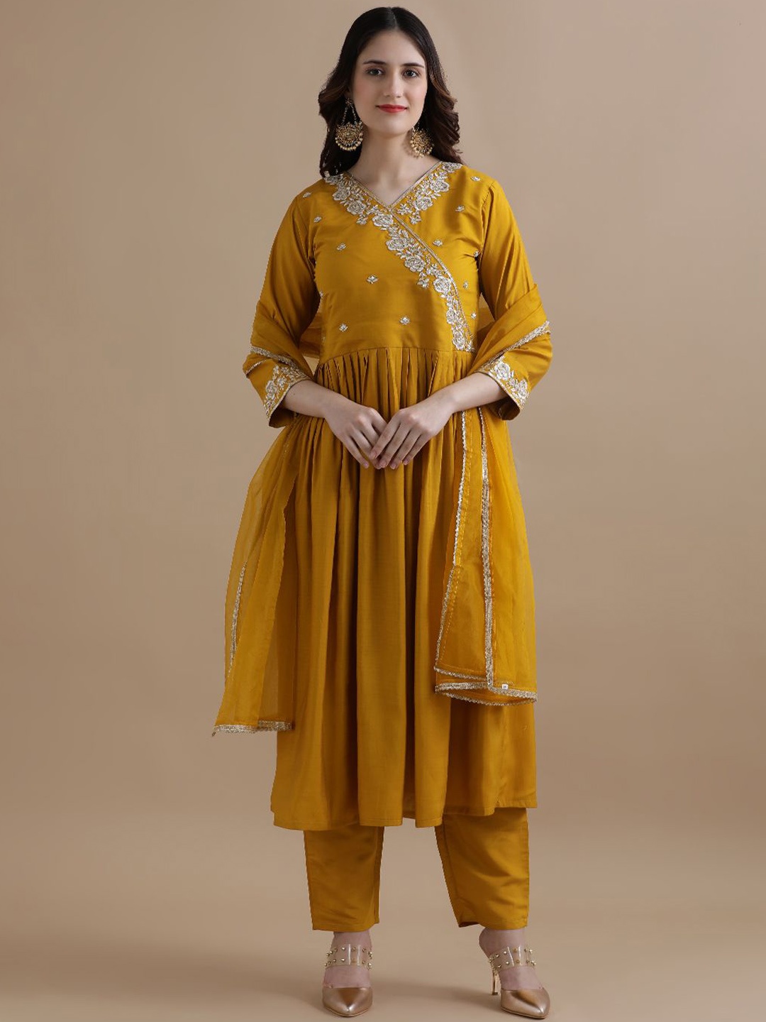 

Jaipur Kurti Women Ethnic Motifs Embroidered Angrakha Chanderi Cotton Kurta with Trousers & With Dupatta, Mustard