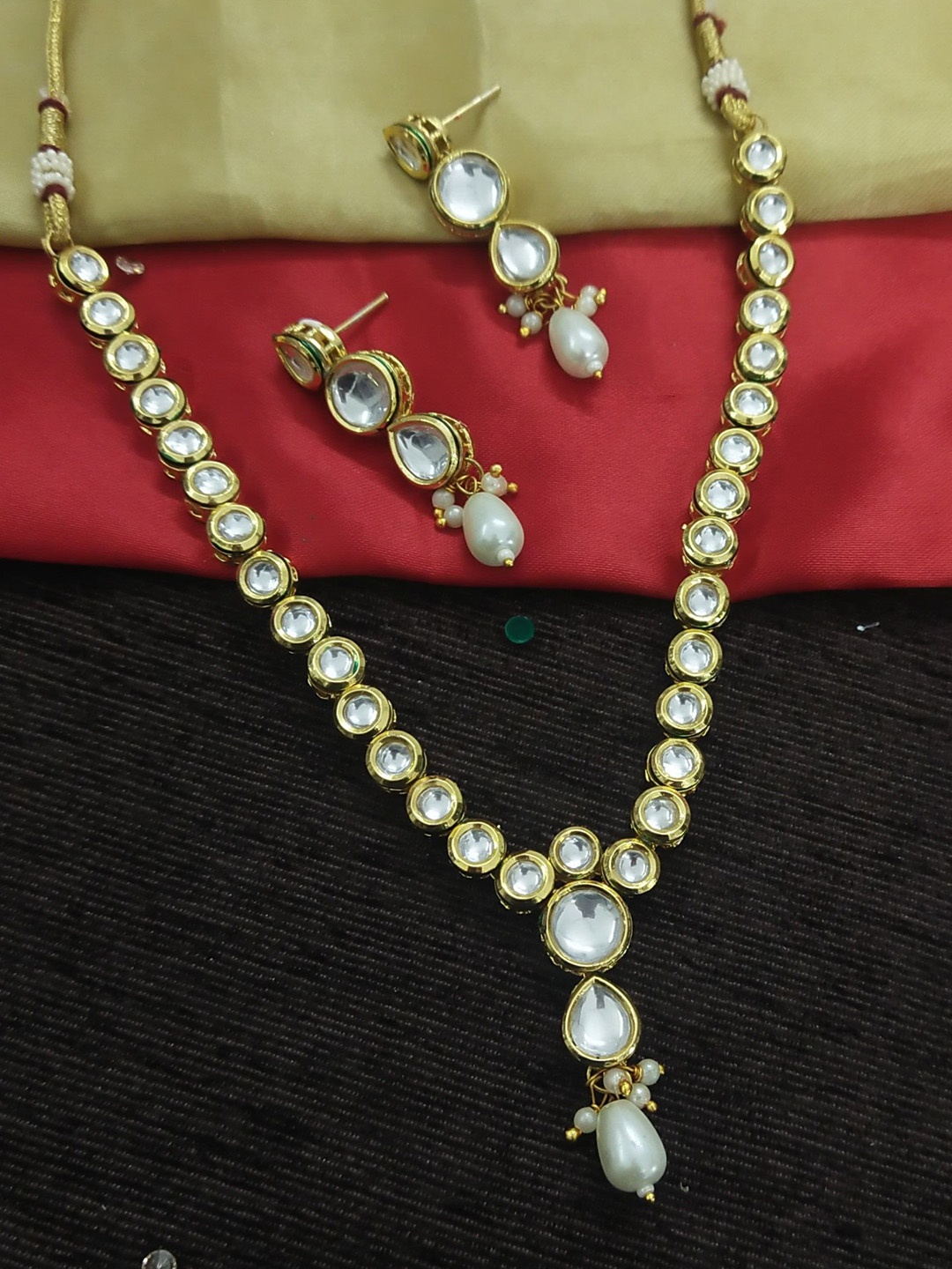 

Knigght Angel Jewels Gold-Plated Kundan-Studded Jewellery Set, White