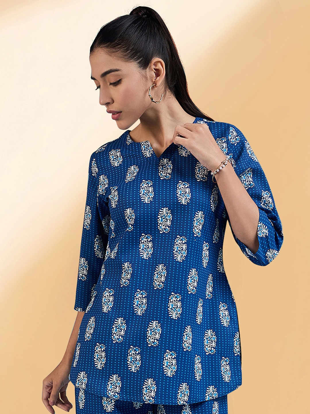 

Winza Designer Women Floral Printed Cotton Top, Blue